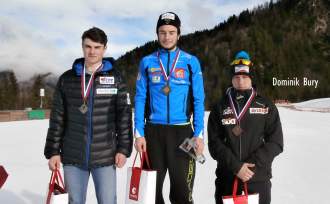 Dominik Bury na podium w Planicy