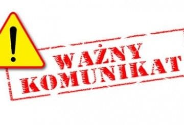 baner z żółtym znakiem i napisem Ważny Komunikat